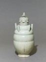 Greenware burial vase with lid in the form of a lotus (EA1956.199)