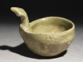 Greenware ladle with handle in the form of a bird-head (EA1956.381)