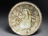 Dish with seated female figure against a foliate background (EA1956.52)