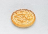 Oval bezel seal with nasta&lsquo;liq inscription and floral decoration (EA1980.14)