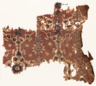 Textile fragment with lobed shapes, possibly leaves (EA1990.1028)