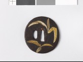 Tsuba with cycad leaves and a radish