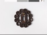 Lobed tsuba with 12 different mon (EAX.10618)