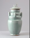 Greenware or qingbai ware funerary vase with lid surmounted by a dog (LI1301.100)