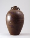 Black ware wine bottle with 'tea-dust' glazes (LI1301.365)
