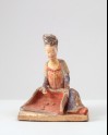 Figure of female attendant with a winnowing basket (LI1301.395)