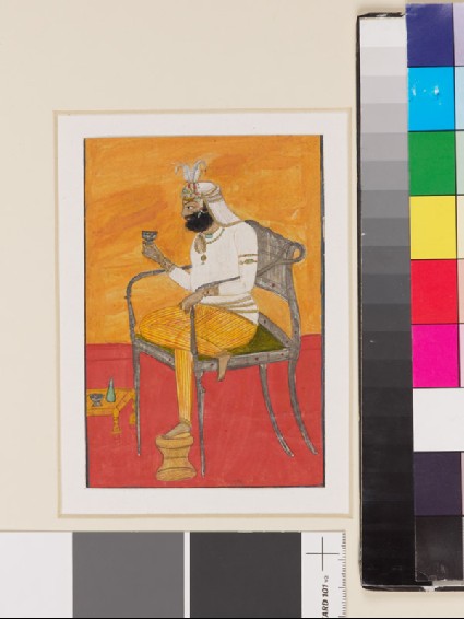 Man seated in European-type chairfront