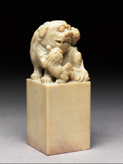 Private seal with Buddhist inscription and surmounted by a shishi, or lion dogside