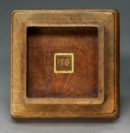 Base of a seal box with geometric decorationtop