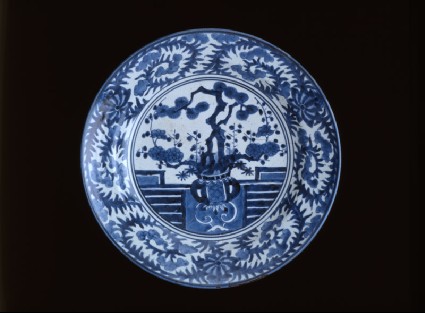 Dish depicting a vase of prunus and pinetop