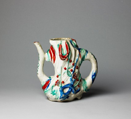 Ewer in the form of a tree trunkside