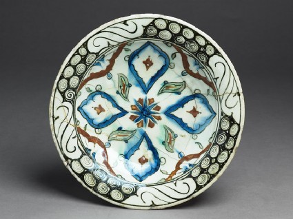 Dish with lobed medallions and leavestop