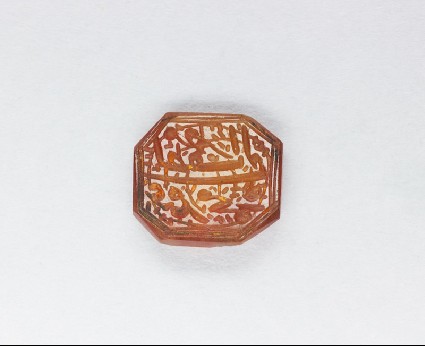 Octagonal bezel seal with nasta’liq inscription and spiral decorationfront
