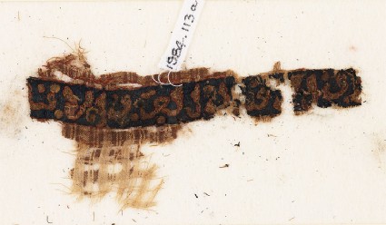 Textile fragment with inscriptionfront