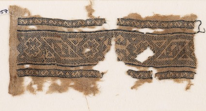 Textile fragment with bands of lozenges, stepped diamond-shapes, and trianglesfront