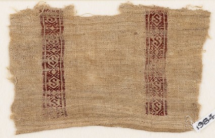 Textile fragment with S-shapes and diamond-shapesfront