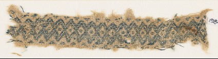 Textile fragment with band of linked diamond-shapesfront