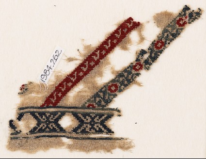 Textile fragment with crosses made of hooksfront