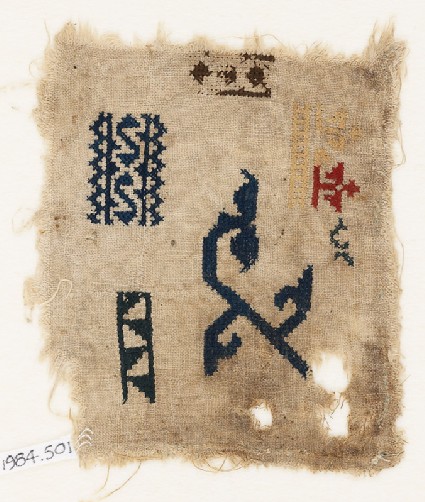Sampler fragment with vine scrollfront