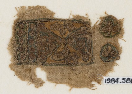 Textile fragment with two trefoils and rows of circlesfront