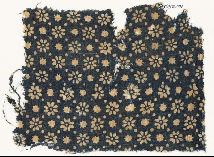 Textile fragment with rosettes, stars, and dotsfront