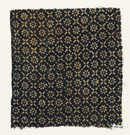 Textile fragment with flowers, dots, and rosettesfront
