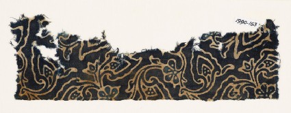 Textile fragment with swirling flower-heads and leavesfront