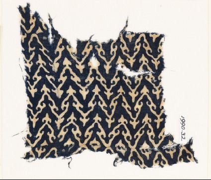 Textile fragment with linked chevrons and trefoilsfront