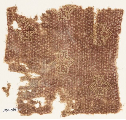 Textile fragment with large plants and possibly bandhani, or tie-dye, imitationfront