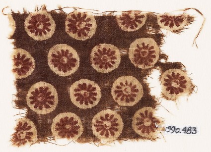 Textile fragment with rosettes in circlesfront