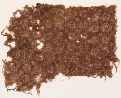 Textile fragment with rosettes, stars, dots, and crossesfront