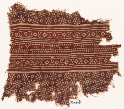 Textile fragment with rosettes, dots, and lobed diamond-shapesfront