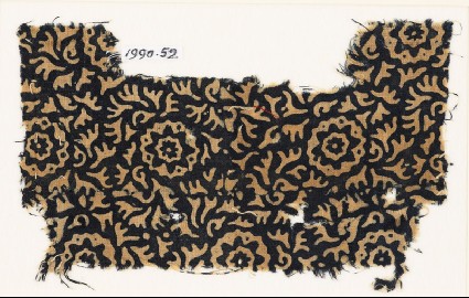 Textile fragment with swirling leaves and flowersfront