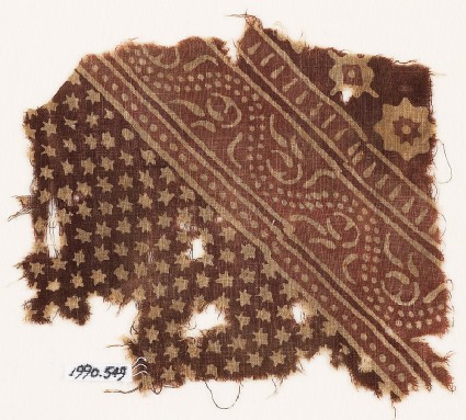 Textile fragment with small and large stars, and a dotted vinefront