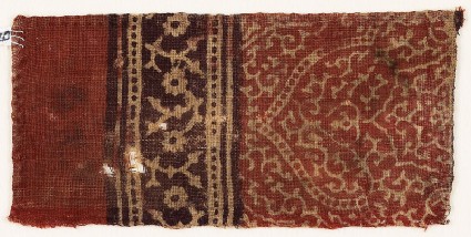 Textile fragment with tendrils, a half-medallion, and rosettesfront