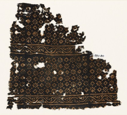 Textile fragment with rosettes, lobed squares, and dotsfront