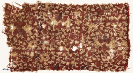 Textile fragment with tendrils, leaves, and flowersfront