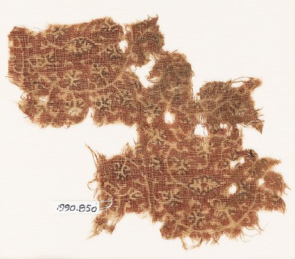 Textile fragment with tendrils and leavesfront