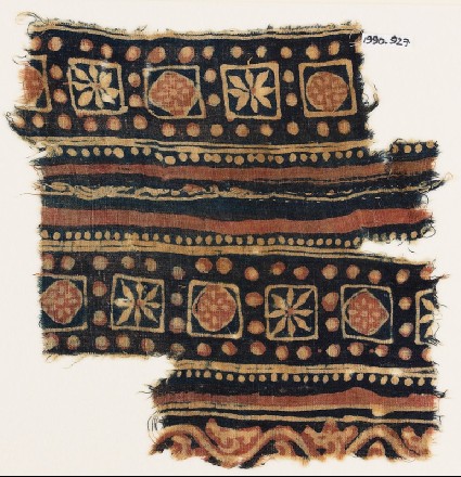 Textile fragment with squares and rosettesfront