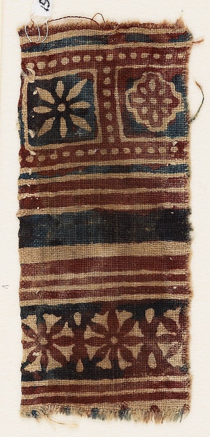 Textile fragment with squares and rosettesfront