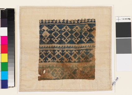 Textile fragment with double palmettes, diamond-shapes, and hooksfront