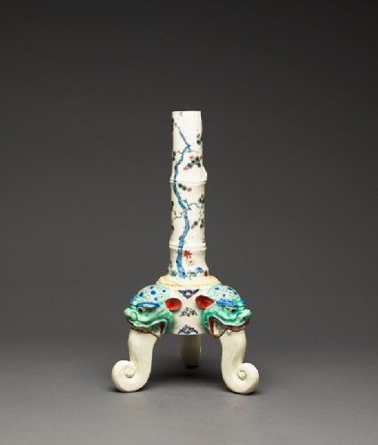 Tripod candlestick with three shishi heads and floral decorationside