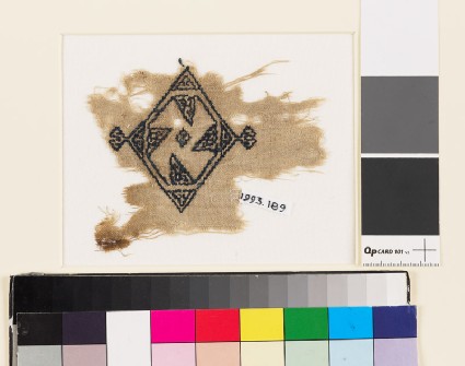 Textile fragment with rosette and diamond-shapefront