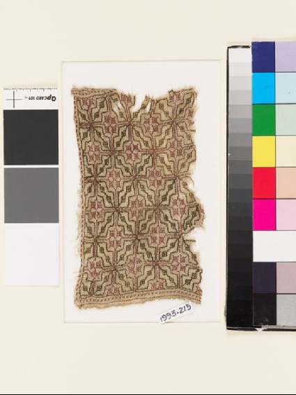 Textile fragment with lattice of diamond-shapes and squaresfront