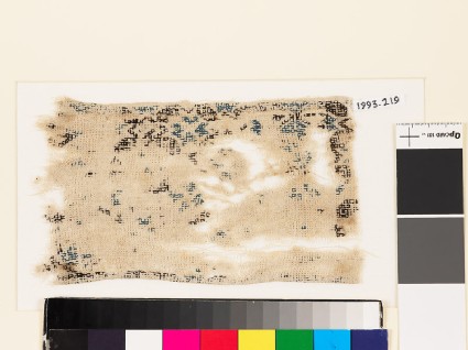 Textile fragment with geometric pattern, triangles, and hexagonsfront