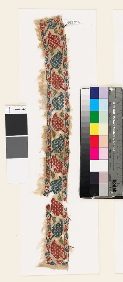 Textile fragment with leaves and squaresfront