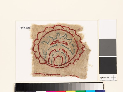 Textile fragment with multi-petalled circle and leaffront