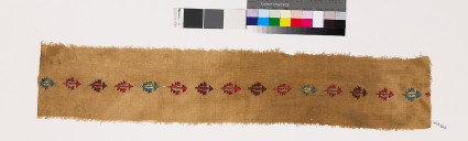 Textile fragment with stylized plantsfront