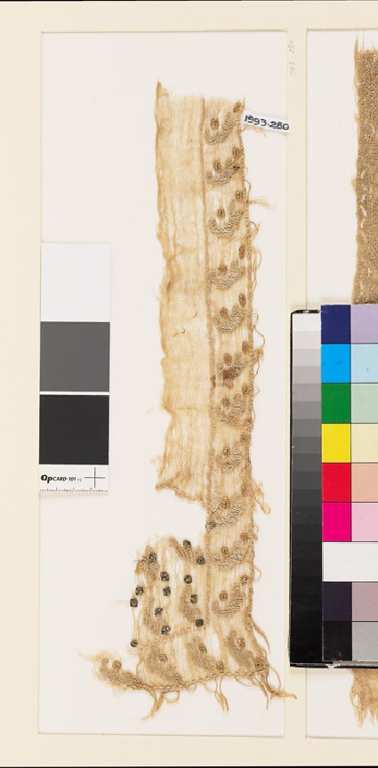 Textile fragment with leaves and dotsfront