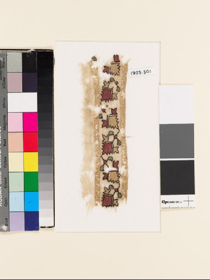 Textile fragment with stylized flower-shapesfront